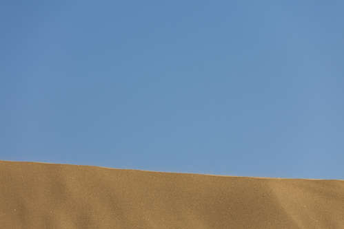 Sand mot himmel